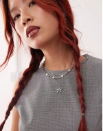 lissie star necklace with blue cubic zirconia stone in platinum plated