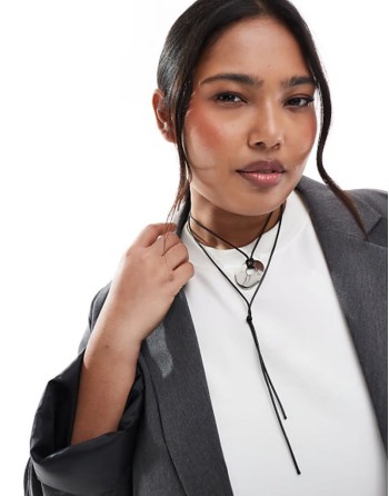 Curve necklace with multirow molten pendant and cord design in silver tone