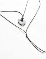 Curve necklace with multirow molten pendant and cord design in silver tone