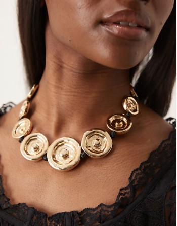 Limited Edition necklace with swirl and hammered detail in gold tone
