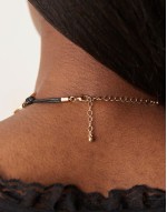 Limited Edition necklace with swirl and hammered detail in gold tone