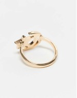 ring with star and moon design in gold tone