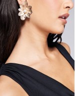 earrings with textured petal design in gold tone