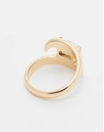 ring with wrap around crystal detail in gold tone