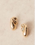 stud earrings in bubble design in gold tone
