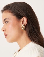 stud earrings in bubble design in gold tone
