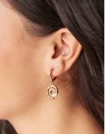 huggie hoop earrings with swirl pendant