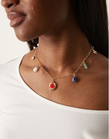 shell and natural stone multicharm necklace in gold