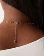 shell and natural stone multicharm necklace in gold