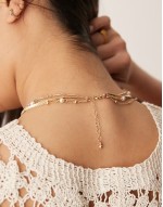 multirow necklace with pearl and heart detail in brushed gold tone