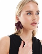 stud earrings with floral detail in burgundy