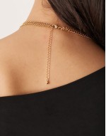 multirow necklace with long tassel detail in gold tone
